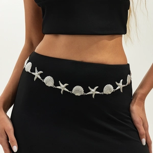 Silver hip-hop waist chain with embossed metal sea shells and starfishes on black outfit