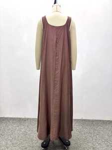 Back view detail of brown-purple sleeveless maxi dress with crinkle texture and A-line cut