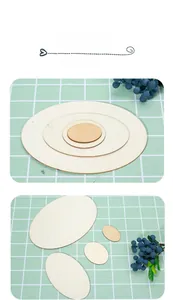 Detailed view of various sized oval unfinished wood slices for DIY crafts and home decor