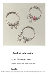 Detailed view of adjustable stainless steel charm bracelets with bear and heart pendants