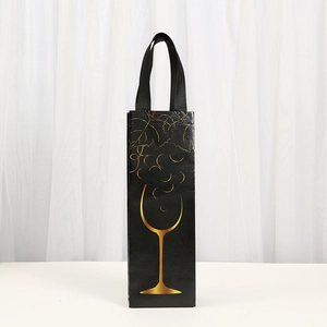 Elegant black non-woven wine gift bag with gold foil wine glass and vine printing