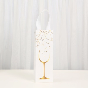Non-woven white wine gift bag with gold wine glass print and durable carry handle