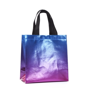 Irritante laser shoppingtas met blauw-paars kleurverloop en stevige zwarte handgrepen