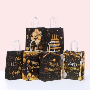 Detail of six black and gold Happy Retirement gift bags with elegant foil patterns