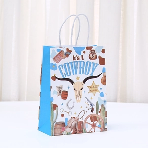 Western cowboy themed gift bag with rustic cactus and skull motifs and white handles