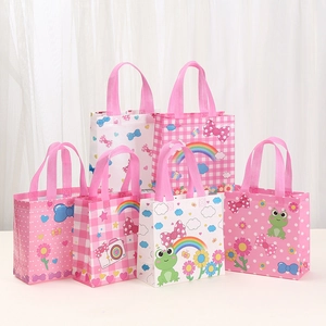 Pink non-woven gift bags with cute cartoon patterns like rainbows and flowers