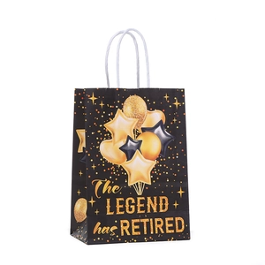 The Legend has Retired gift bag with black gold theme and white woven handles