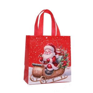 Christmas non-woven gift bag with festive Santa Claus and reindeer cartoon illustration