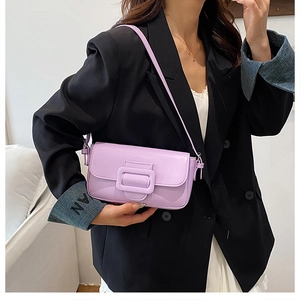 Close-up of light purple rectangular baguette bag with a large decorative square buckle