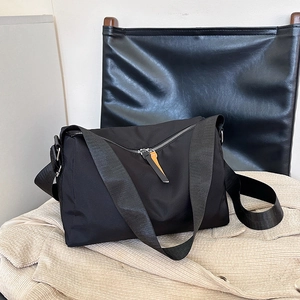 Large capacity black nylon shoulder bag with yellow contrast zipper for daily commuting