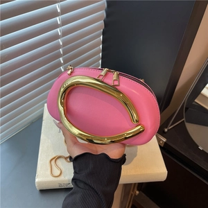 Chic pink crescent leather handbag with gold metal handle and chain shoulder strap