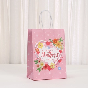 Pink Mother's Day gift bag with floral heart design and sturdy white rope handles