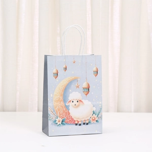 Detail of Eid gift bag with cute sheep, golden moon and festive lantern prints