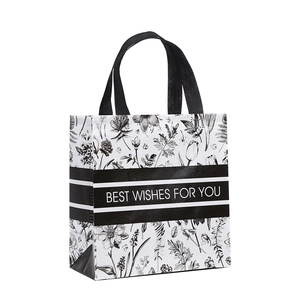 Floral waterproof non-woven tote bag with Best Wishes print and black ribbon handles