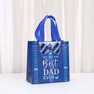 Father's Day non-woven gift bag in deep blue with Best Dad Ever print and bowtie design