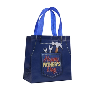 Blue non-woven gift bag with Happy Father's Day print and tool illustrations