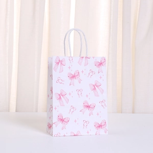 Bolsa de regalo de papel con lazo rosa y asas de cuerda para cumpleaños y fiestas