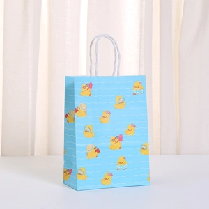 Light blue paper gift bag with yellow duck summer patterns and white rope handles