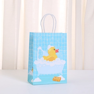 Light blue gift bag with yellow rubber duck pattern and white twisted rope handle