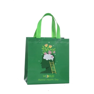 Green non-woven shopping bag featuring World Mental Health Day print and green handles