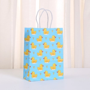 Sky blue paper gift bag with cute yellow cartoon ducks and crown patterns