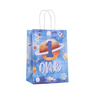Space astronaut themed 1st birthday paper gift bag with planet print and white handle