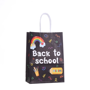 Black Back to School gift bag with colorful stationery patterns and white woven handles