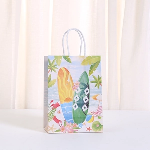 Summer beach themed paper gift bag with surfboards, palm leaves and rope handles