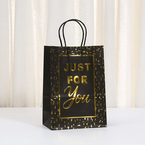 Elegant black kraft paper gift bag with gold foil 'Just For You' text and rope handles