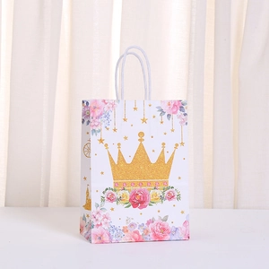 Pink dream castle gift bag with golden crown and floral motifs for birthdays