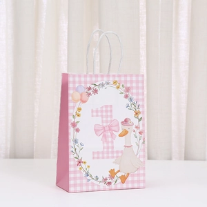 Pink checkered kraft paper gift bag with cute cartoon duck and number one for birthdays