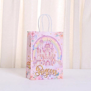 Pink princess castle gift paper bag with rainbow design and white twisted rope handles