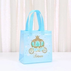 Blue Prince carriage kraft gift bag with gold glitter and floral details for parties