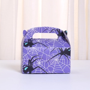 Halloween gift box with spider and web prints featuring purple card paper and handle