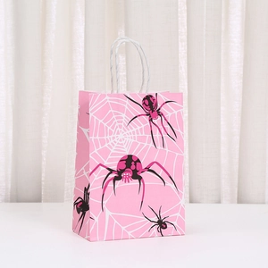 Pink party gift bag with black spider and web patterns and white twisted rope handles