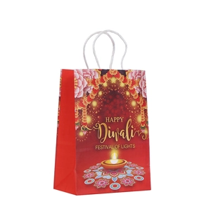 Red Happy Diwali kraft gift bag with golden mandala and diya illustration on white background
