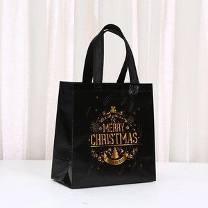 Reusable black non-woven Christmas gift bag with golden Merry Christmas foil lettering