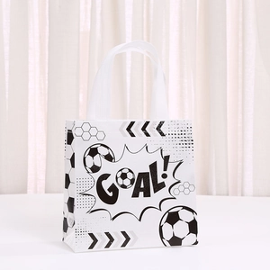 Detail of soccer themed gift bag featuring a bold GOAL design on white non-woven fabric