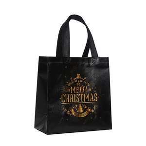 Foldable black and gold Christmas non-woven tote bag with Merry Christmas foil lettering