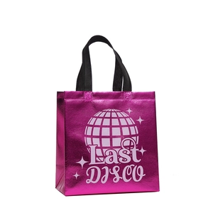 Pink metallic Last Disco non-woven gift bag with disco ball print and black handles
