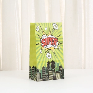 Green kraft paper gift bag with comic style superhero print and city silhouette