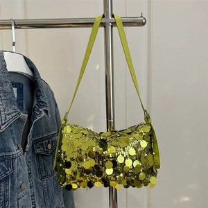 Green sequin baguette bag with long shoulder strap and shiny metallic finish for parties