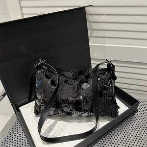 Chic black sequin underarm bag for women with an adjustable leather shoulder strap