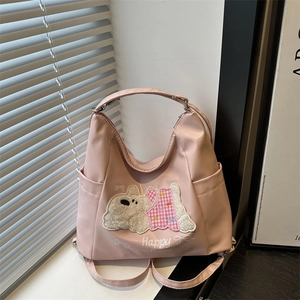 Pink large capacity shoulder bag with Happy Puppy embroidery and side pockets