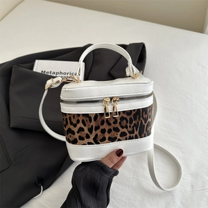 Retro white leather box bag with leopard print stitching and gold zipper handles