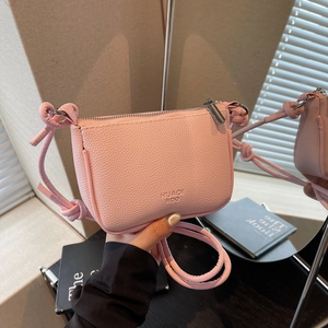 Pink lychee texture leather mini crossbody bag for women with silver zipper closure