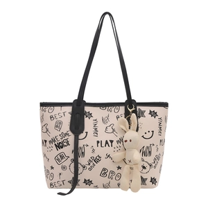Grand sac cabas blanc cassé à imprimé graffiti noir et charmant lapin suspendu