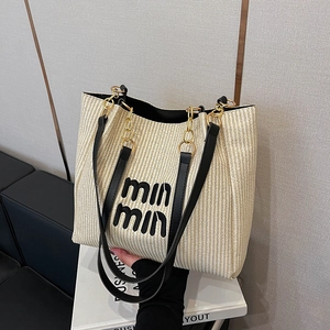 Large capacity straw tote bag with black min min velvet lettering and leather chain strap