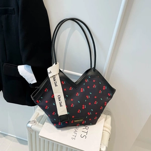 Large black polka dot tote bag with cherry print and chic shoulder strap for women