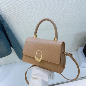 Fashionable beige crocodile pattern baguette bag with gold buckle and adjustable strap